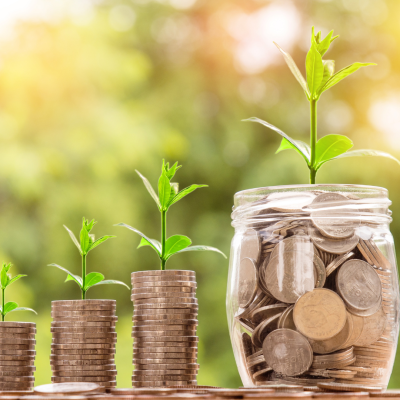 The image likely depicts a person depositing money into a savings account at a bank. The person might be interacting with an ATM, a bank teller, or using online banking services. The image could symbolize the concept of saving money for future financial goals or building a financial safety net. It might also highlight the importance of responsible financial planning and the benefits of utilizing savings accounts as a financial tool. Stock market blogs